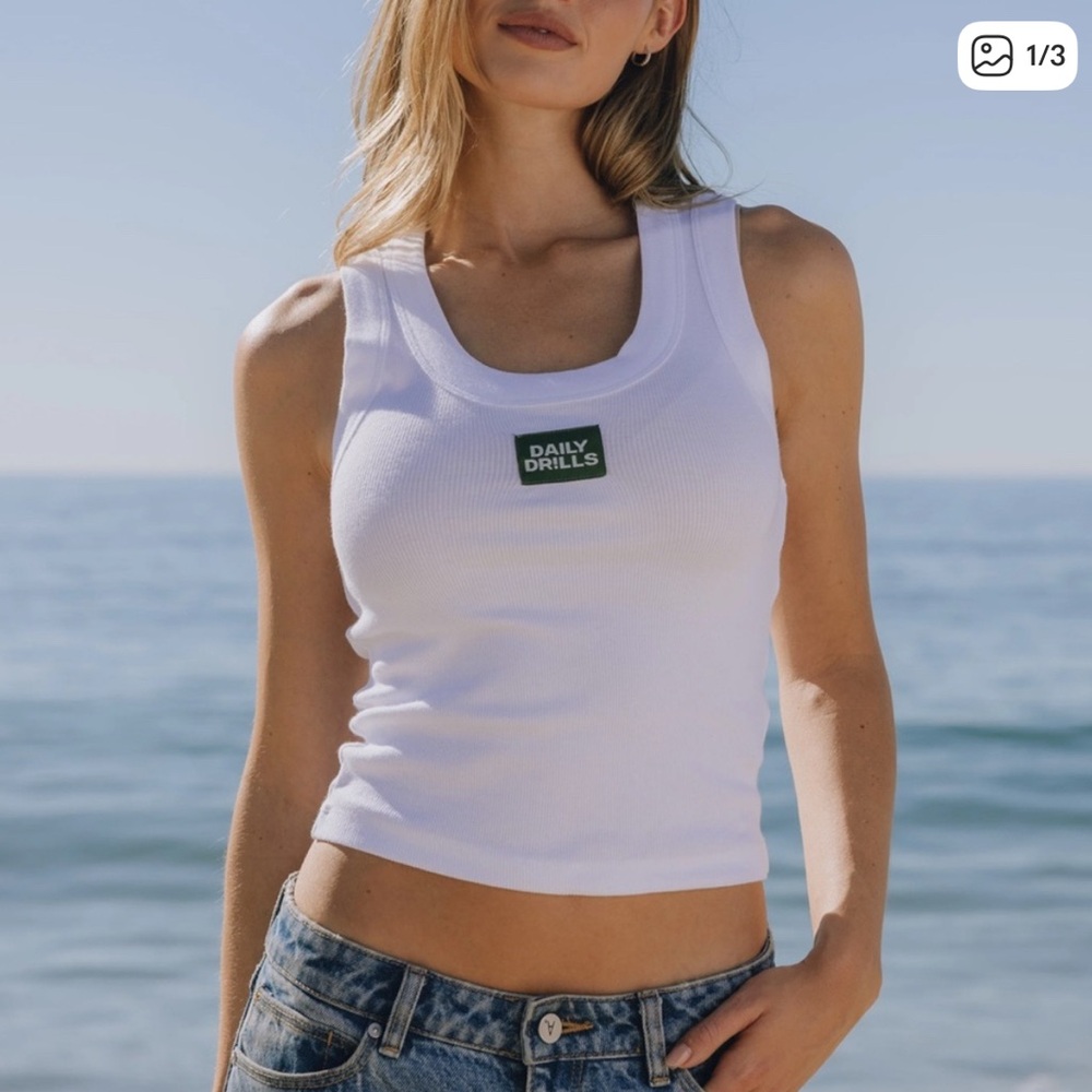 Daily Drills White Ribbed Scoop Tank with Green Logo